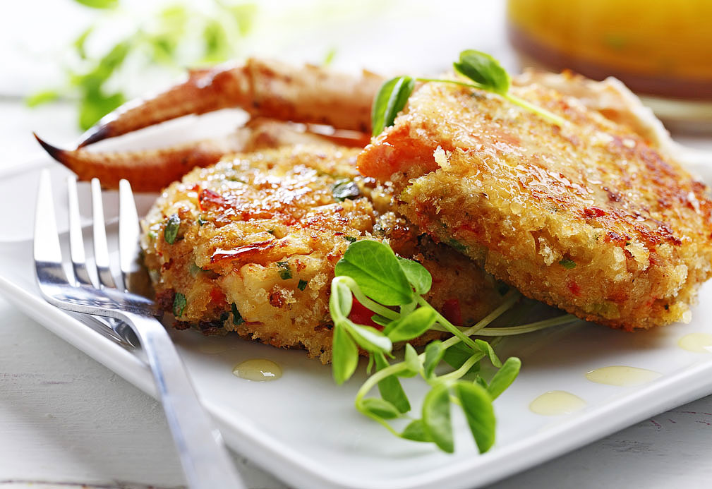 Crab Cakes with Warm Black Truffle Vinaigrette recipe made with canola oil by the Culinary Institute of America