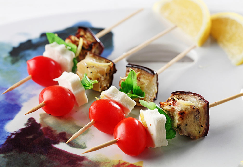 Roasted Eggplant with Tomatoes and Fresh Basil recipe made with canola oil by Kathleen Bruno