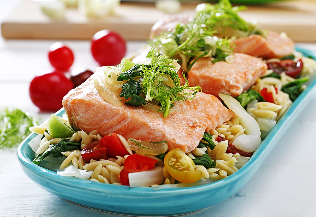 Salmon Confit over Lemon Spinach and Heirloom Tomato Orzo recipe made with canola oil by the Culinary Institute of America