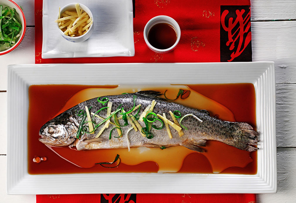 Steamed Whole Fish with Ginger and Green Onions recipe made with canola oil by Nathan Fong