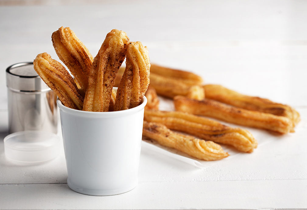 Churros with Spiked Chili Cocoa Sugar recipe made with canola oil 