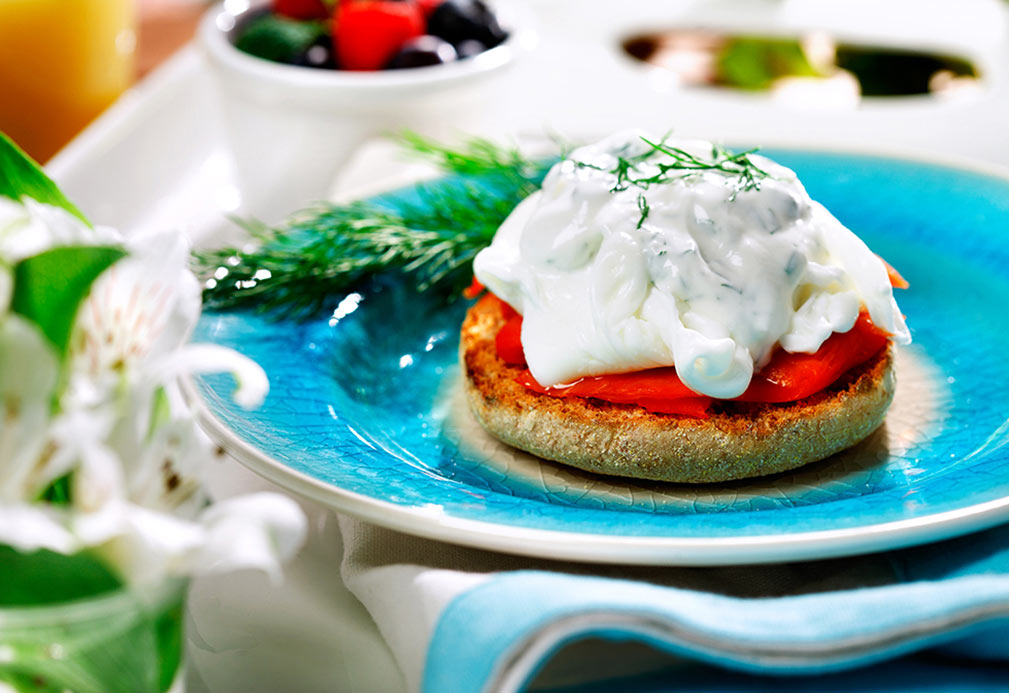 Salmon eggs benedict recipe made with canola oil developed by Ellie Krieger